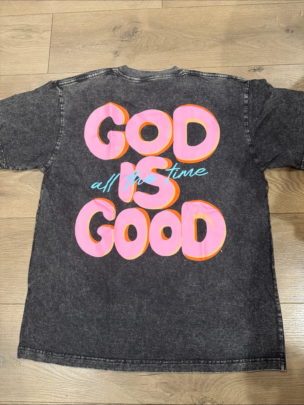 Graphic 'God Is Good'  T-Shirt - Pink/Orange Letters on Black Wash NWT